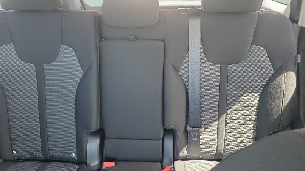 New 2026 Ivory Silver Kia LX image 10
