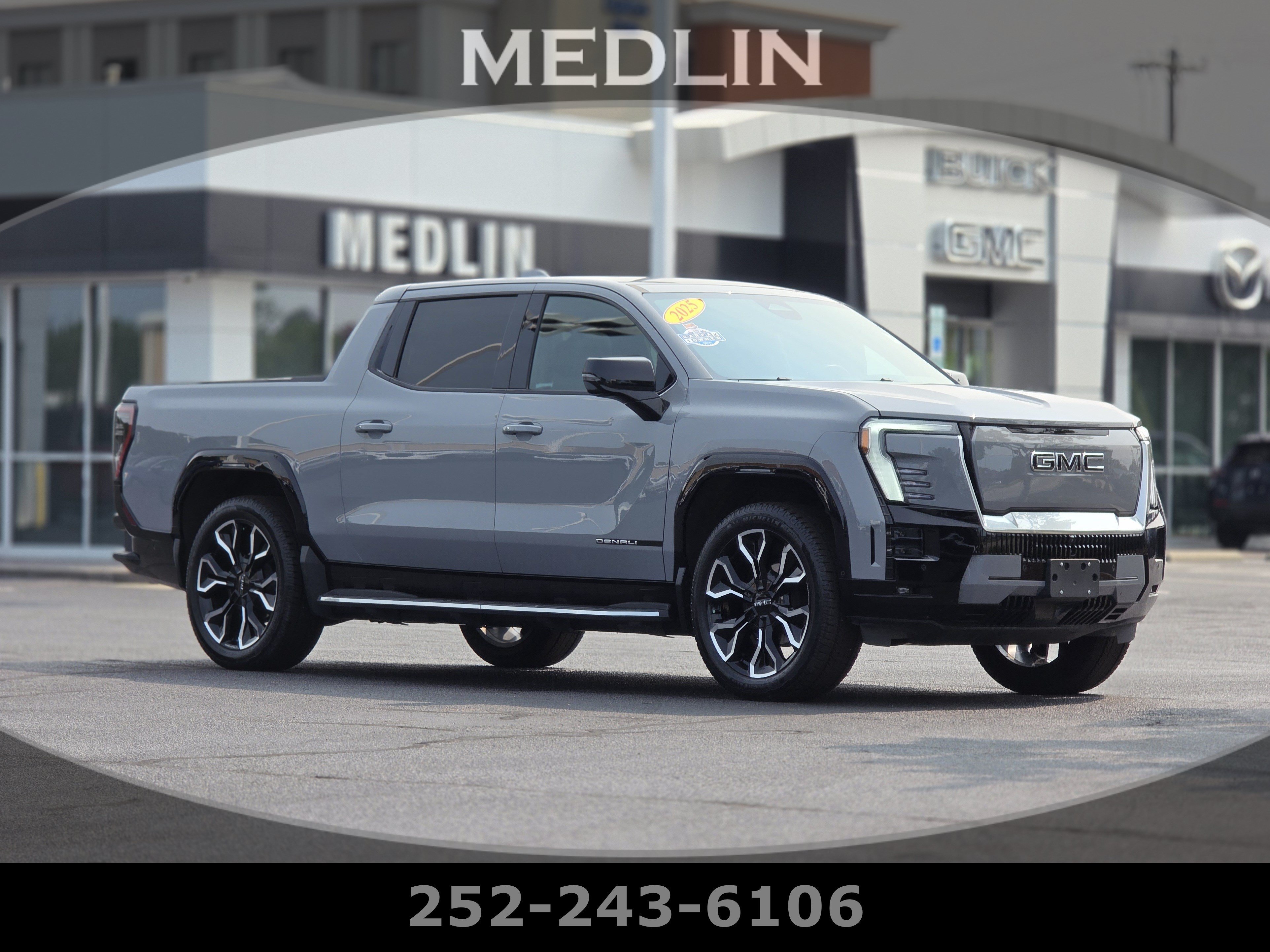 Used 2025 Thunderstorm Gray GMC Max Range Denali image 1