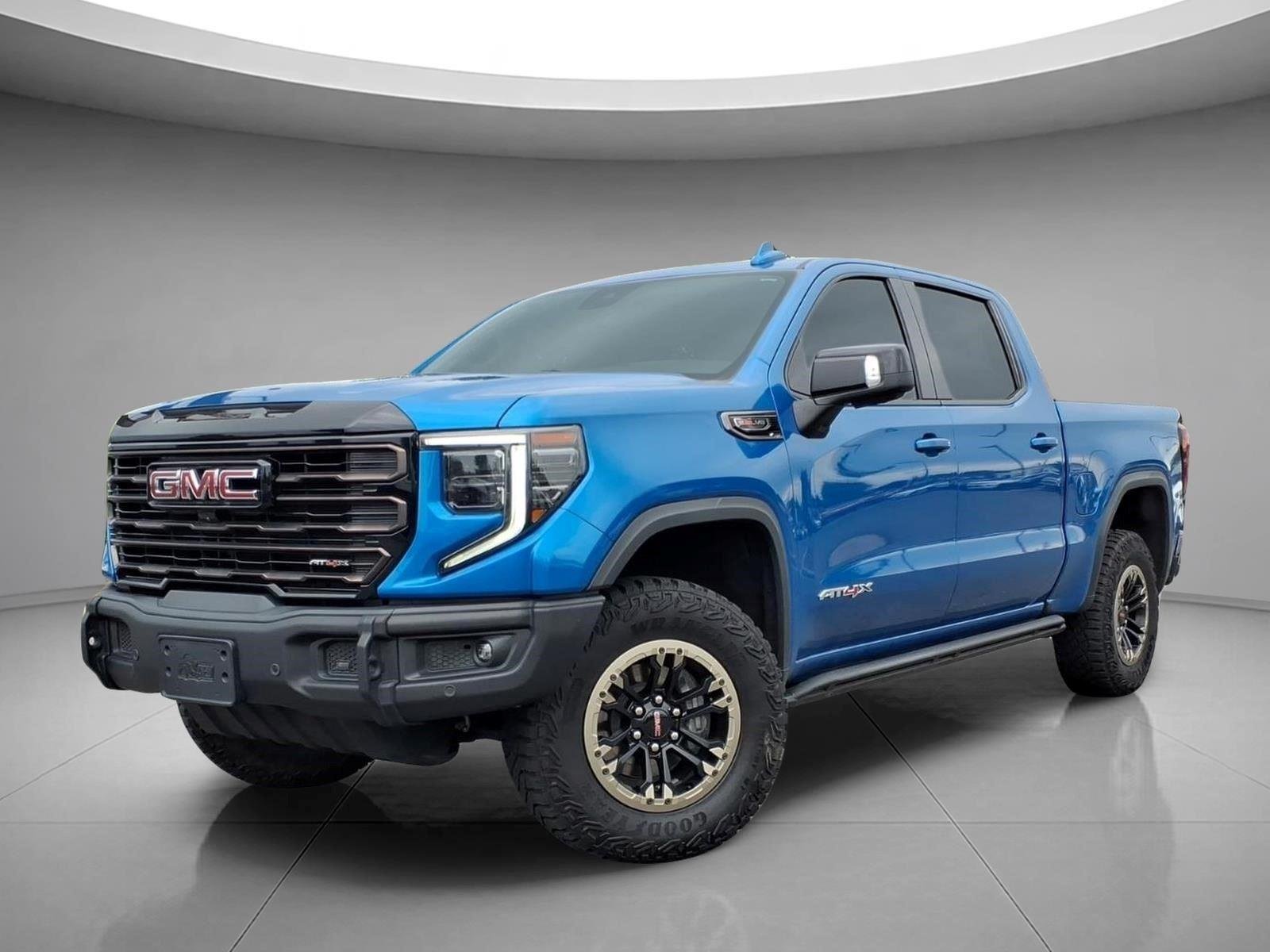 Used 2024 Dynamic Blue Metallic GMC AT4X image 1