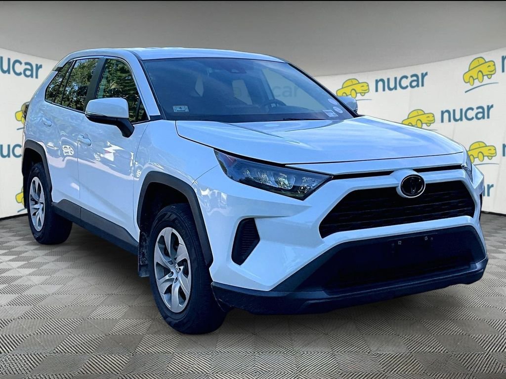 Used 2022 White Toyota LE image 1