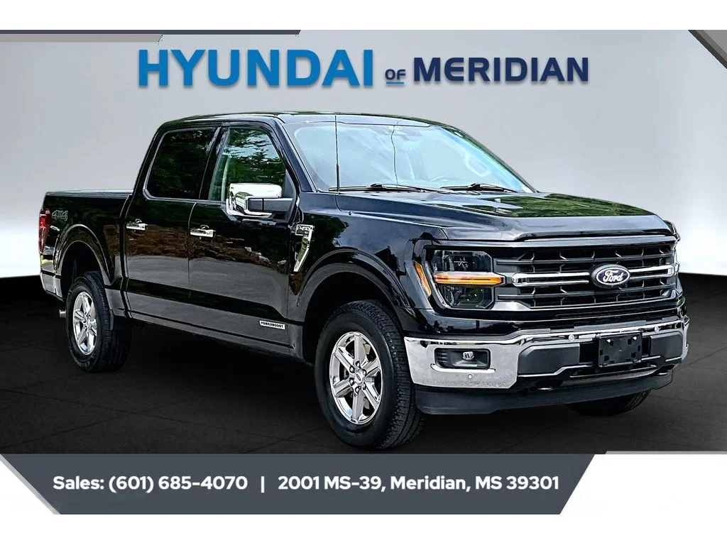 Used 2024 Agate Black Metallic Ford XLT image 1