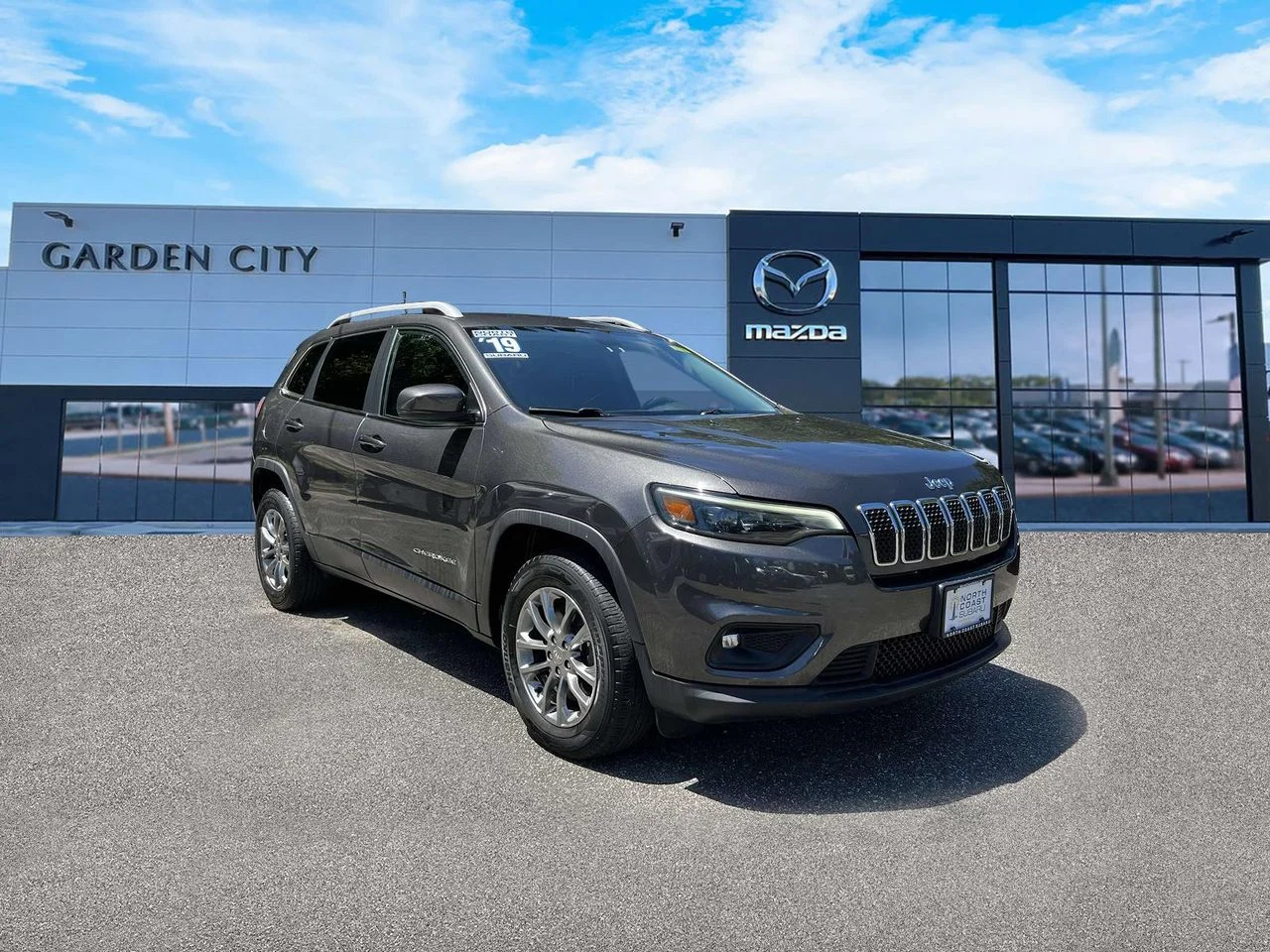 Used 2019 Granite Crystal Metallic Clearcoat Jeep Latitude Plus 4x4 image 1