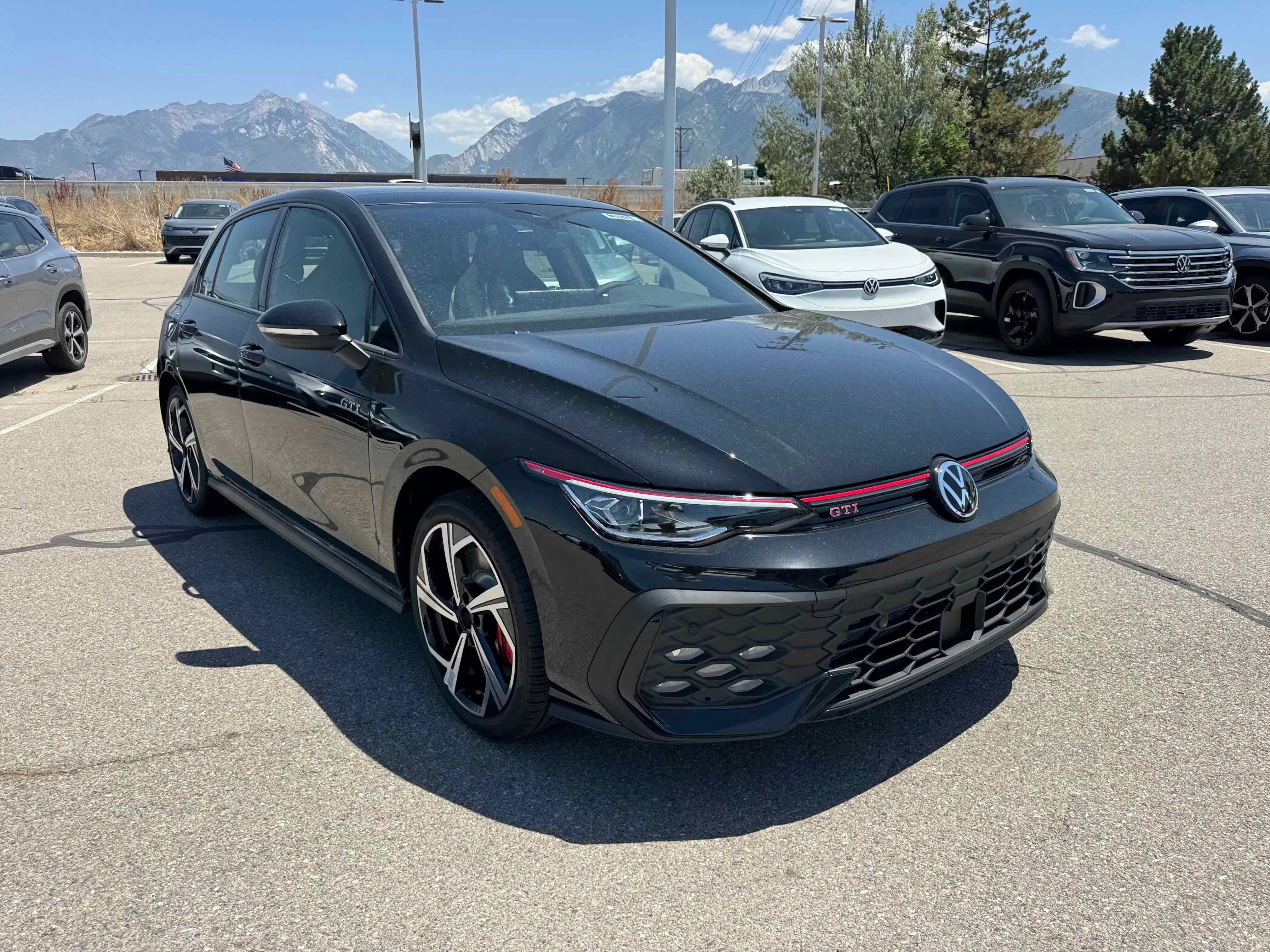 New 2025 Black Volkswagen SE image 9