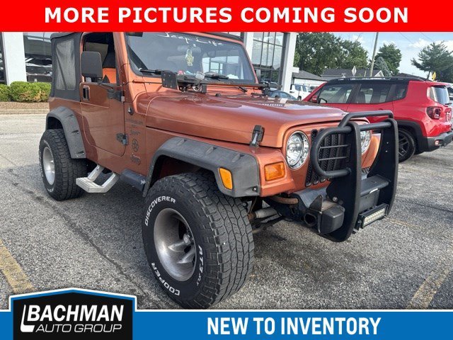 Used 2001 Amber Fire Pearl Jeep Sport image 2