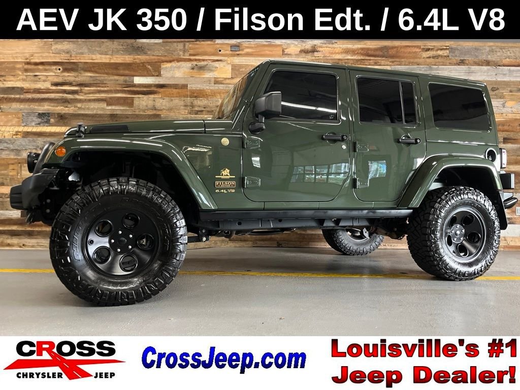Used 2014 Black Clearcoat Jeep Unlimited Rubicon image 1