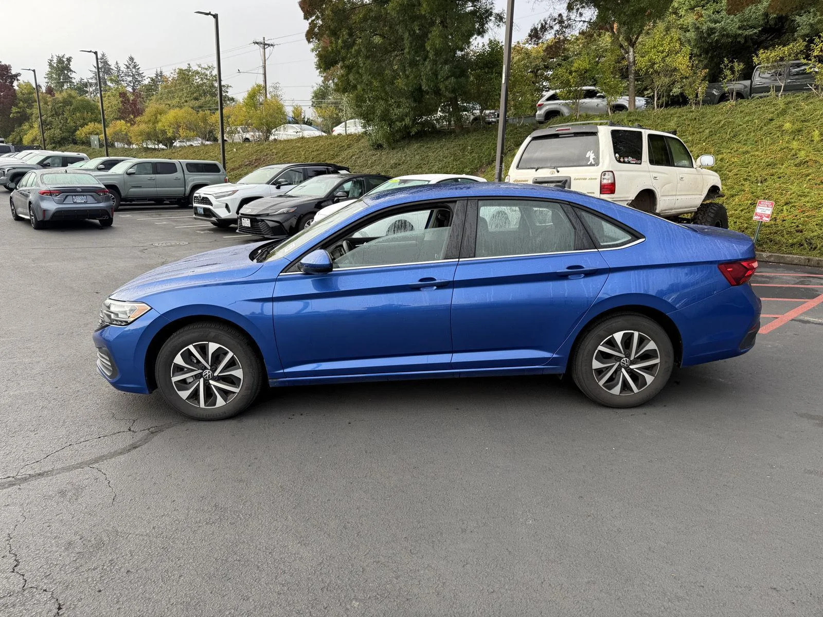 Used 2024 Rising Blue Metallic Volkswagen S image 2