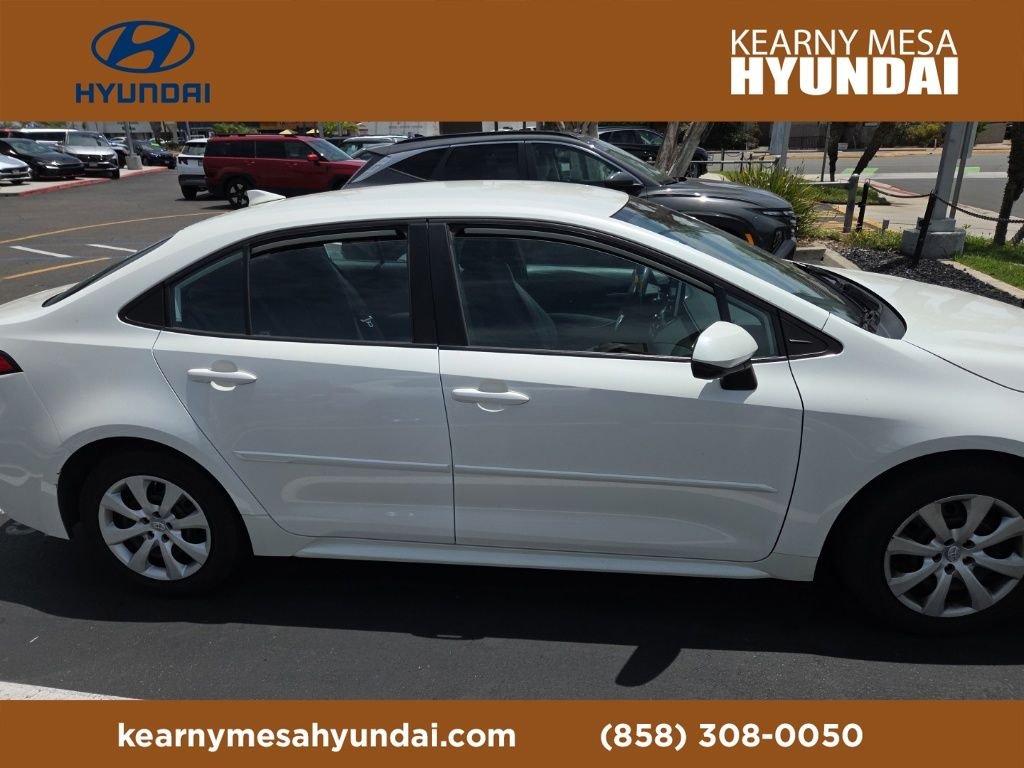 Used 2021 Blizzard Pearl Toyota LE image 1