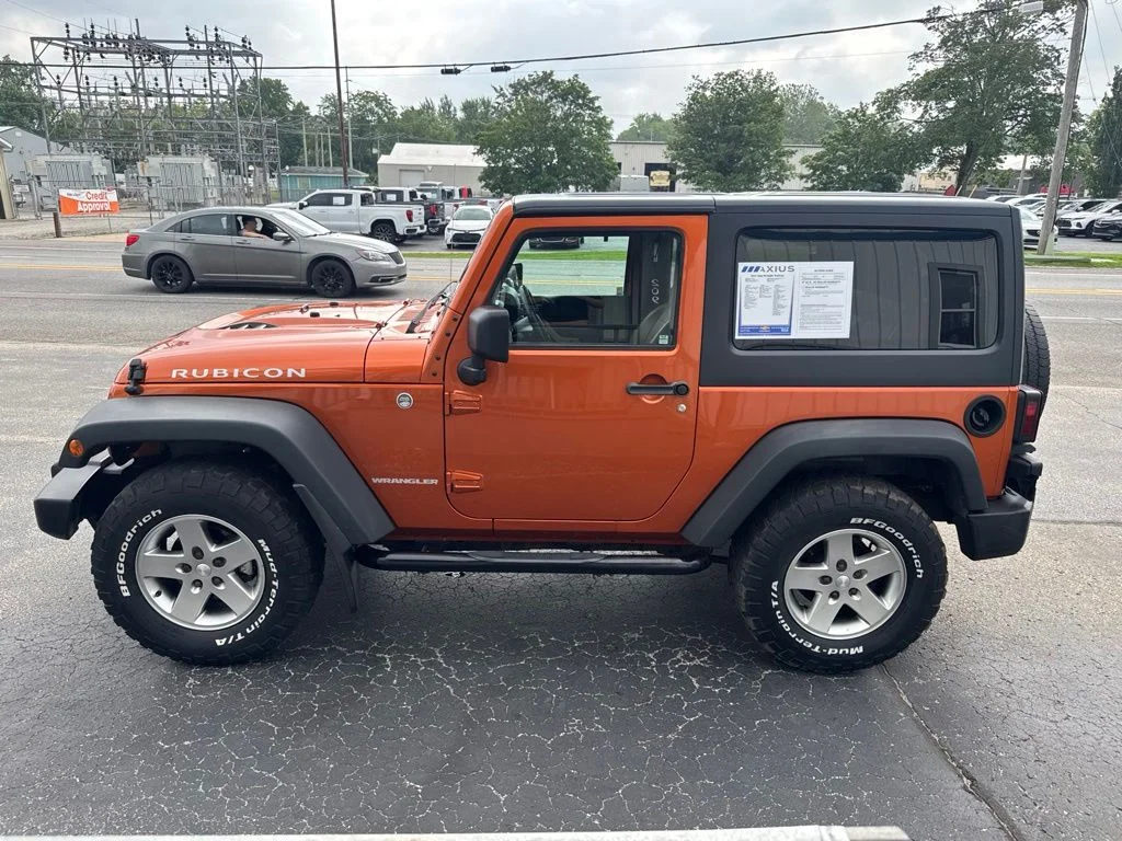 Used 2011 Orange Jeep Rubicon image 4