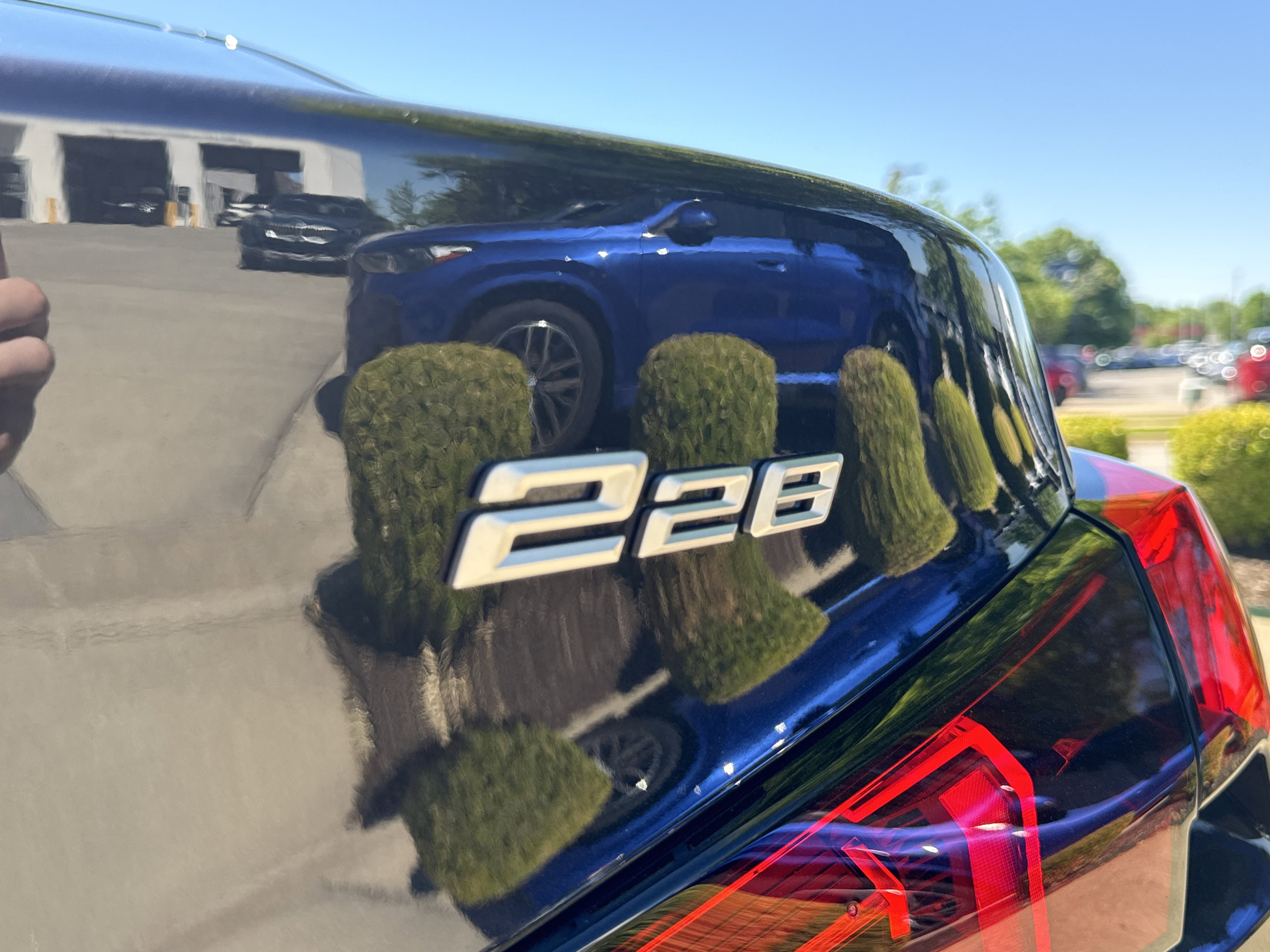 New 2026 0475 Black Sapphire Metallic BMW 228 xDrive image 7