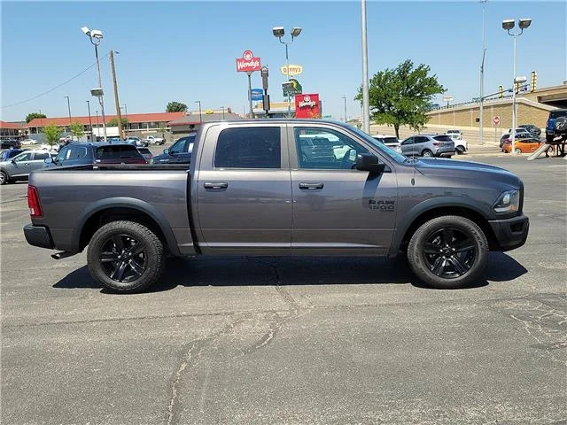 Used 2024 Granite Crystal Metallic Clearcoat RAM SLT 4x2 Crew Cab 5.6 ft. box 140 in. WB image 4