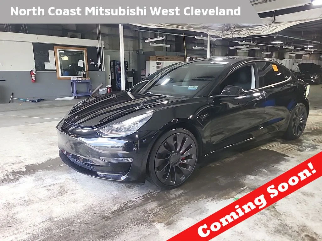 Used 2021 Black Tesla Performance image 1