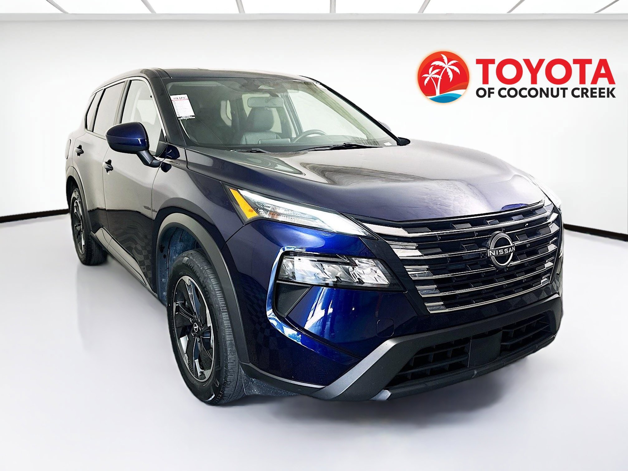 Used 2024 Deep Ocean Blue Pearl Nissan SV image 1