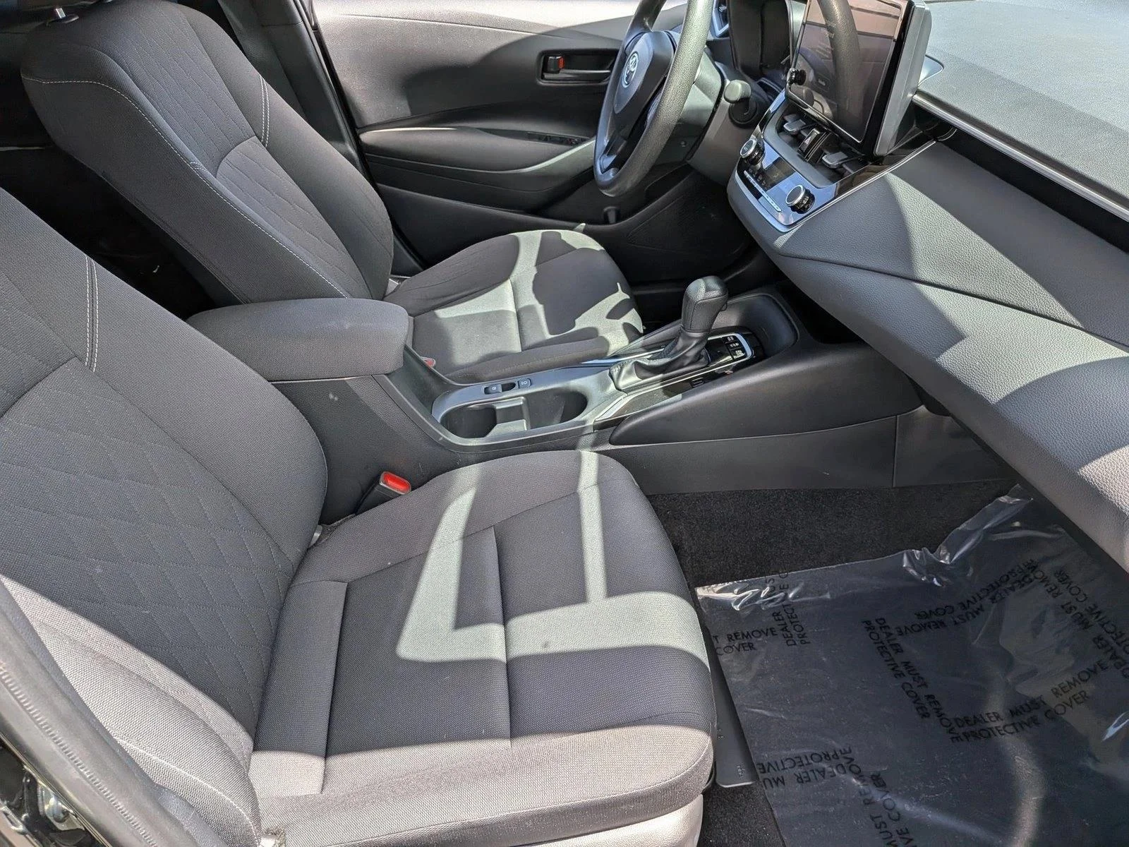 Used 2024 Midnight Black Metallic Toyota Hybrid LE image 19