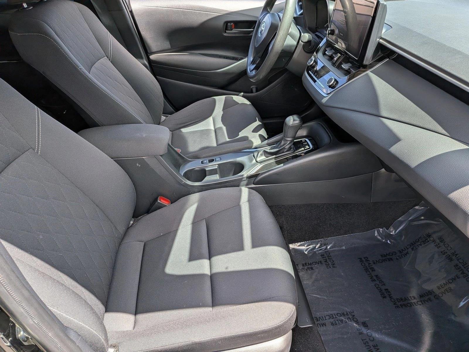 Used 2024 Midnight Black Metallic Toyota Hybrid LE image 19