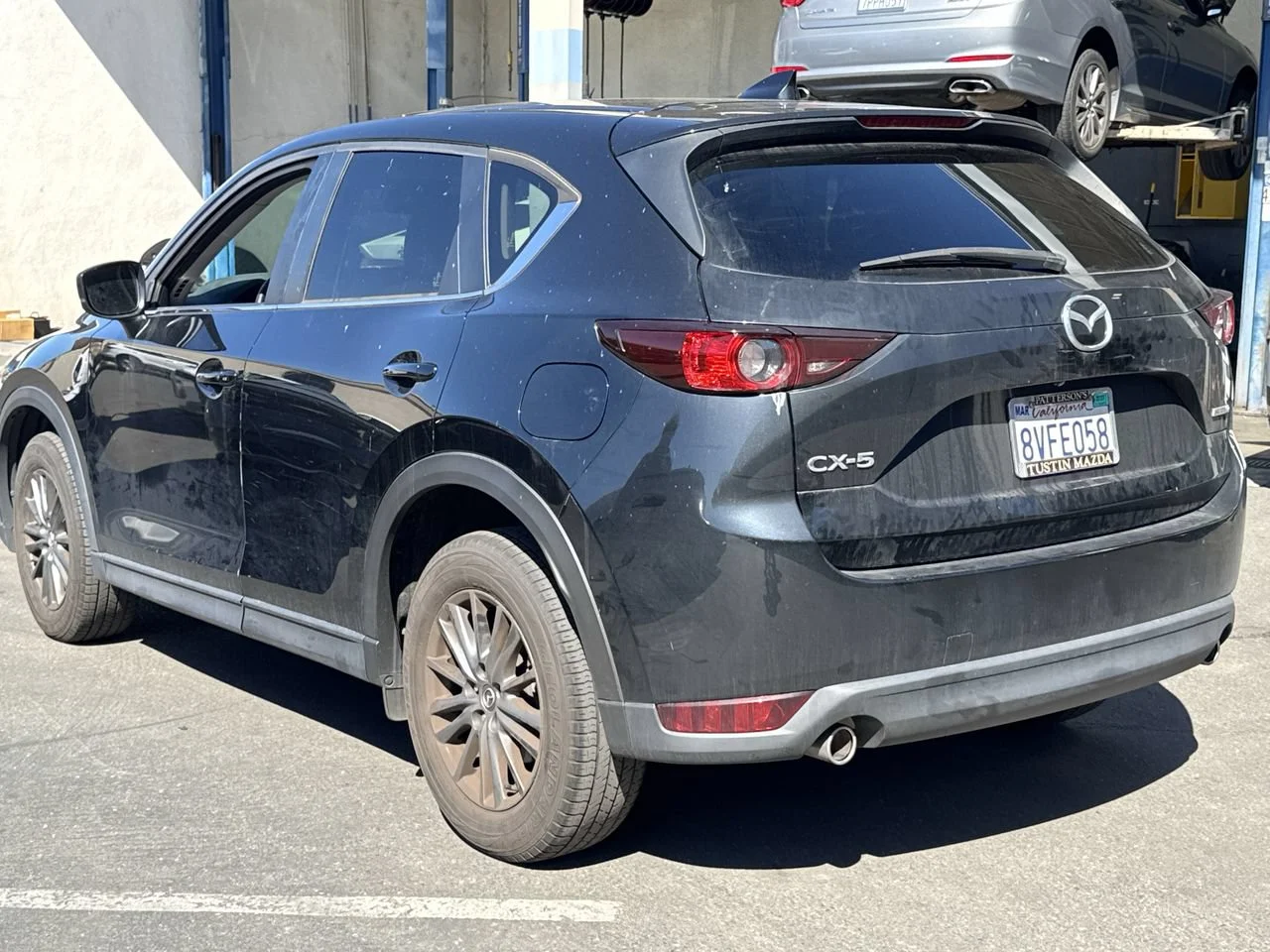 Used 2021 JET BLACK MICA MAZDA TOURING image 3