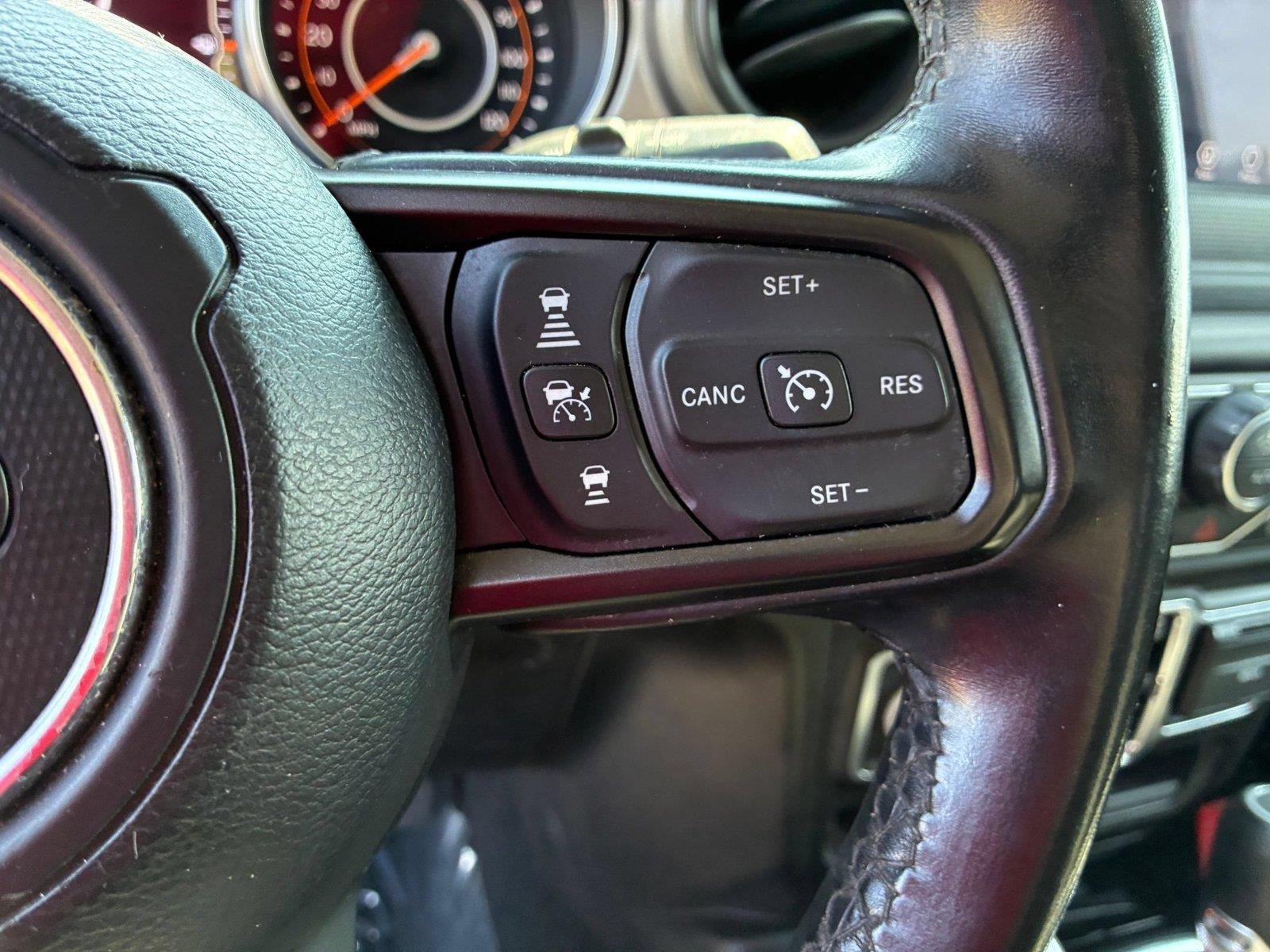 Used 2021 Granite Crystal Metallic Clearcoat Jeep Unlimited Sport S image 16