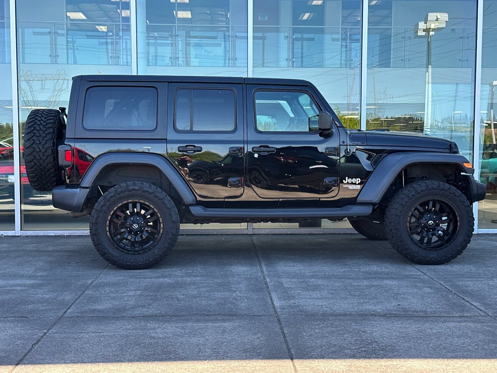Used 2019 Black Clearcoat Jeep Unlimited Sport image 2