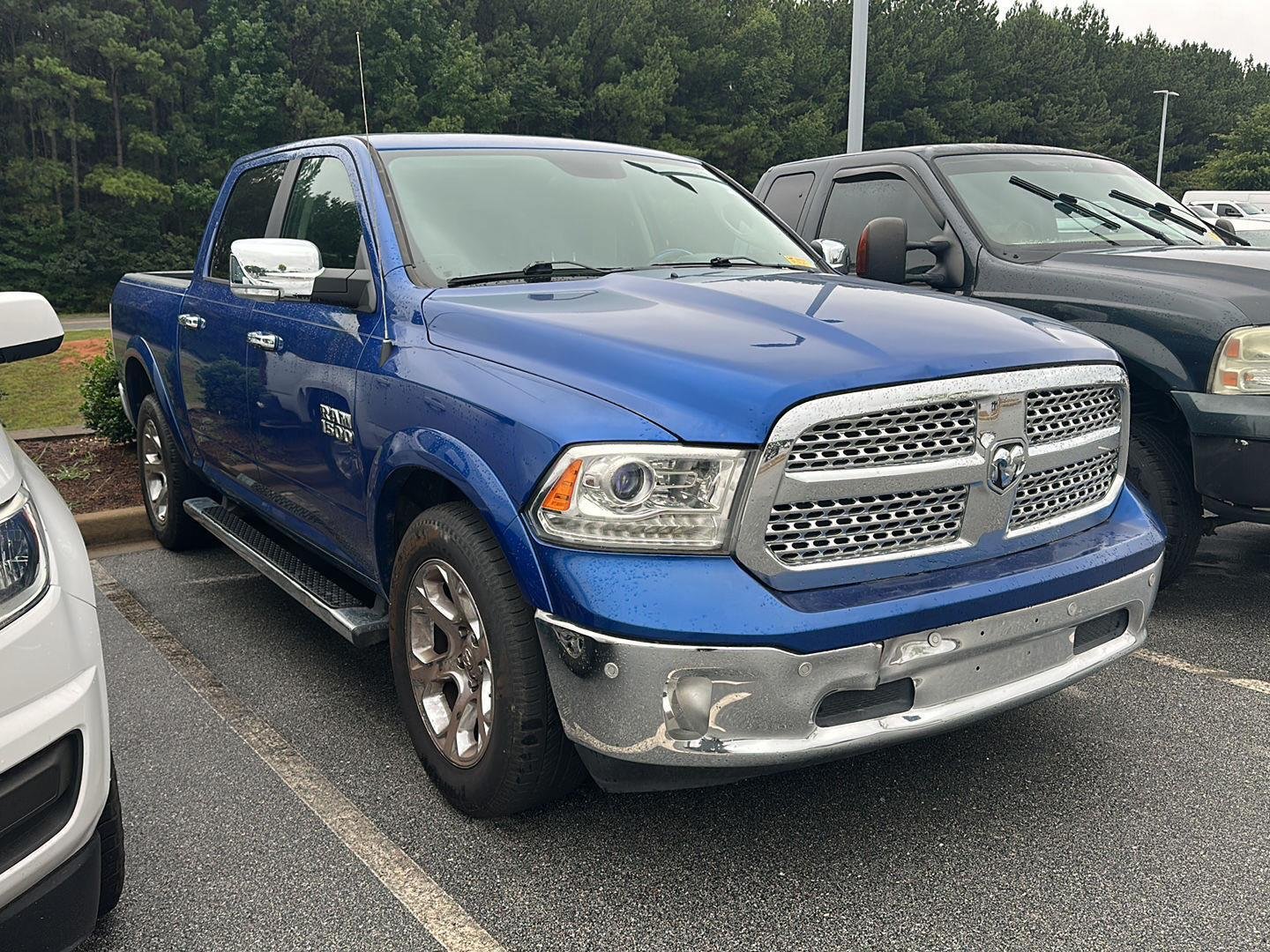 Used 2018 Blue Streak Pearlcoat Ram Laramie image 1