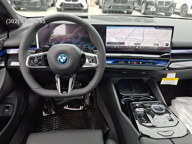 New 2027 Carbon Black Metallic BMW 550e xDrive image 10
