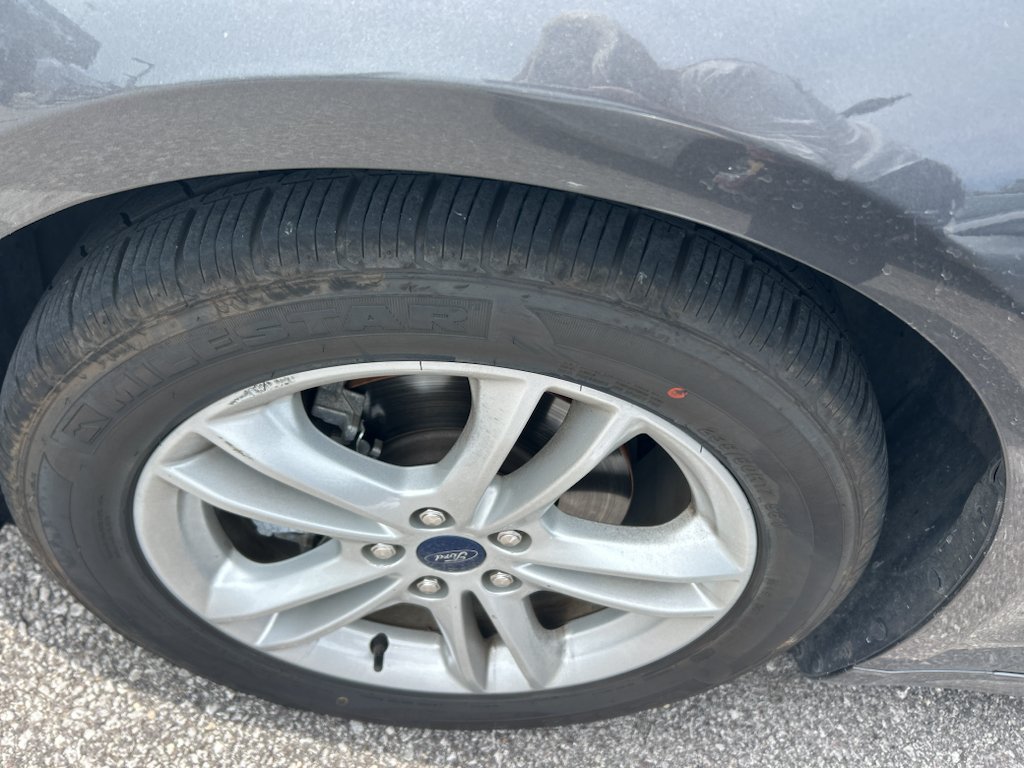 Used 2018 Magnetic Metallic Ford SE image 5