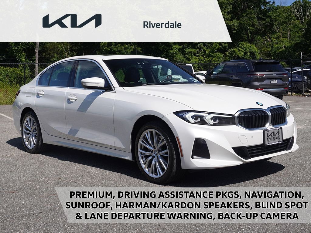 Used 2024 White BMW 330i xDrive image 1