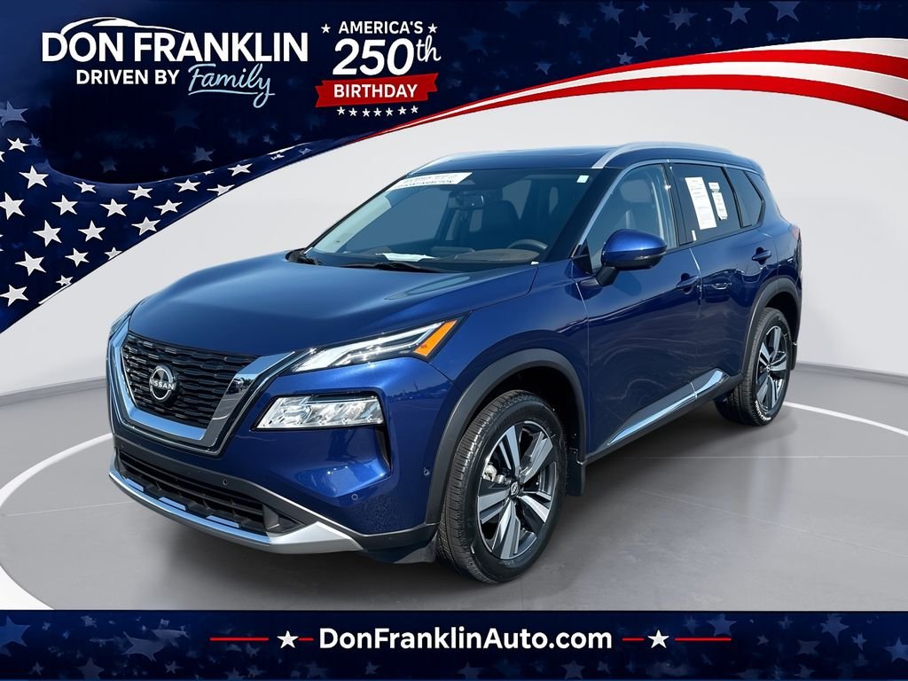 Used 2023 Blue Nissan Platinum image 1