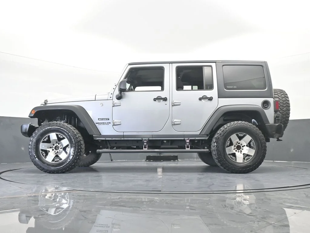 Used 2016 Billet Silver Metallic Clearcoat Jeep Unlimited Sport image 56