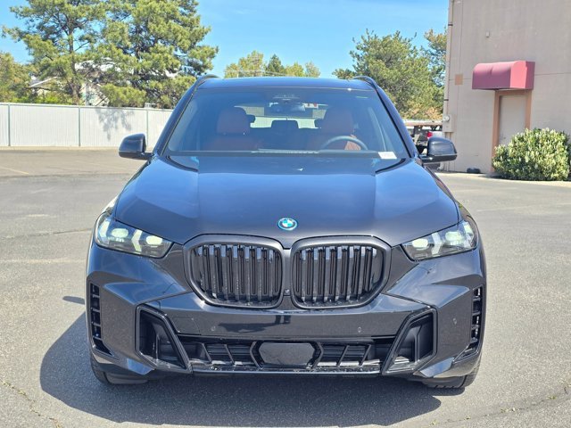 New 2026 Black Sapphire Metallic BMW xDrive50e image 38