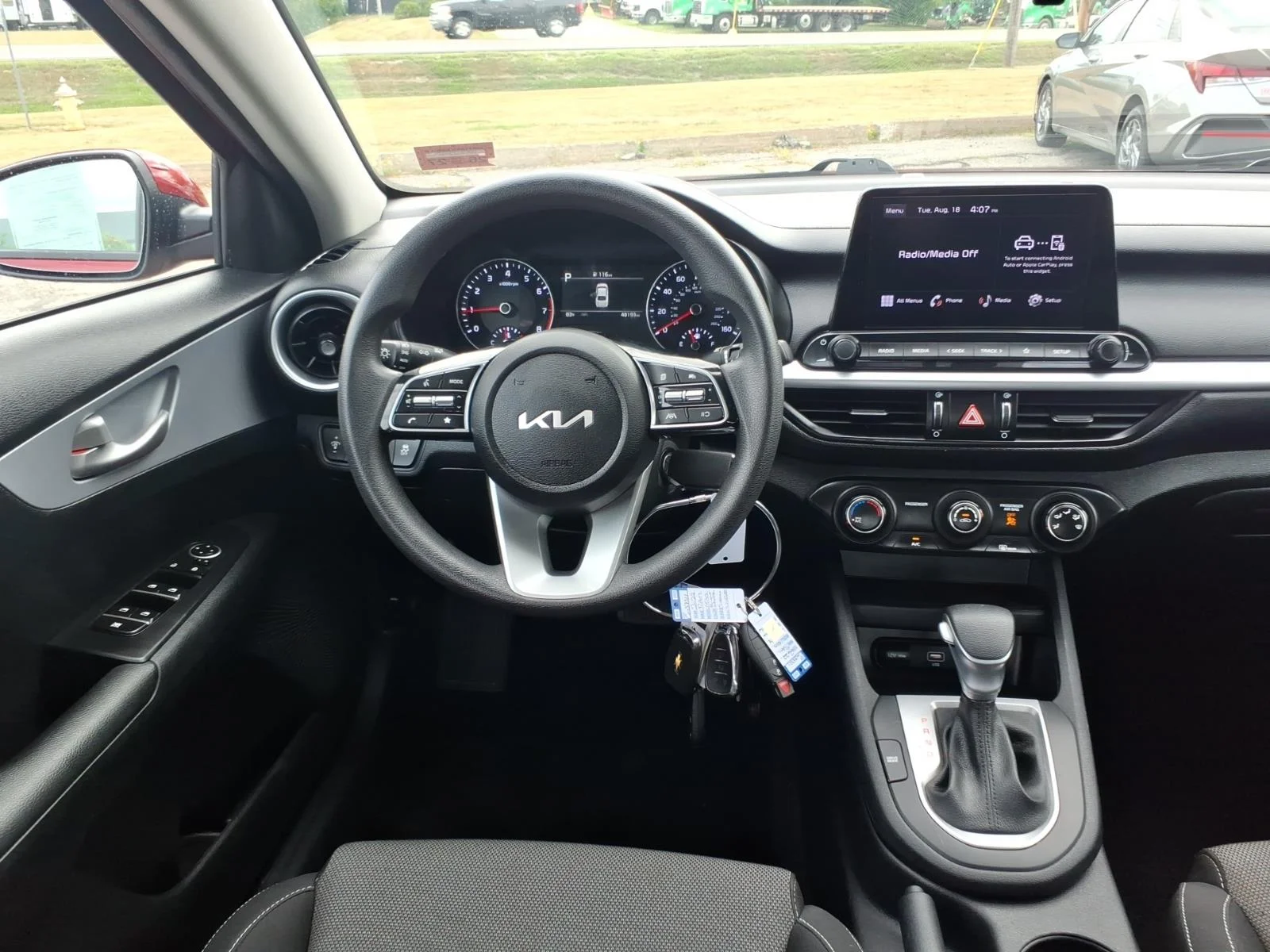 Used 2024 Currant Red Kia LXS image 17