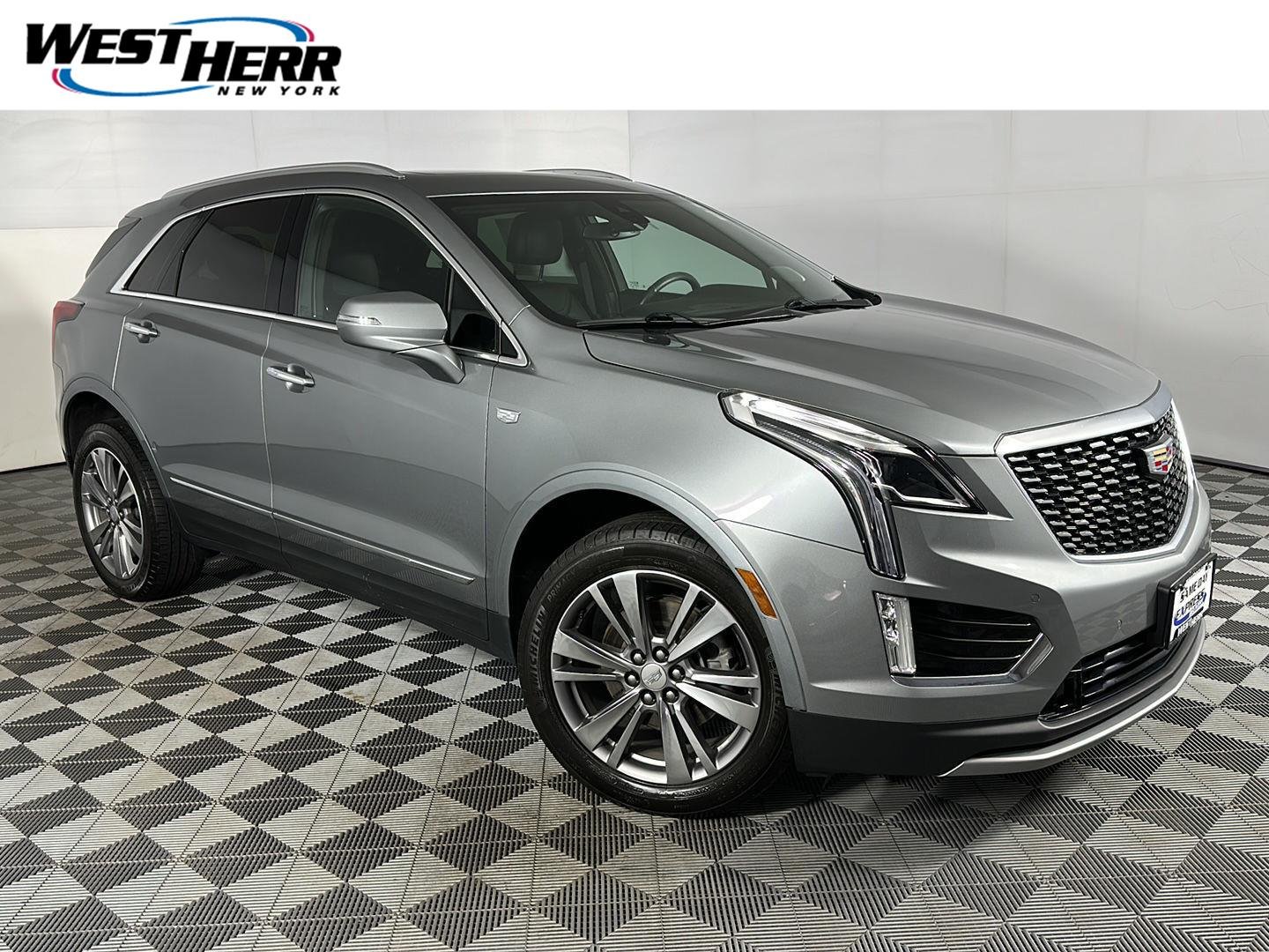 Used 2024 Argent Silver Metallic Cadillac AWD Premium Luxury image 1