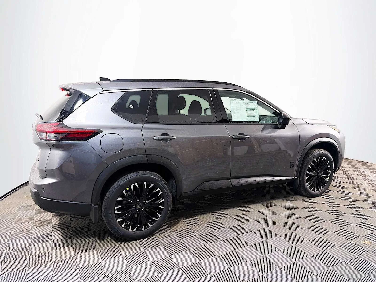 New 2026 Gun Metallic Nissan Dark Armor image 2