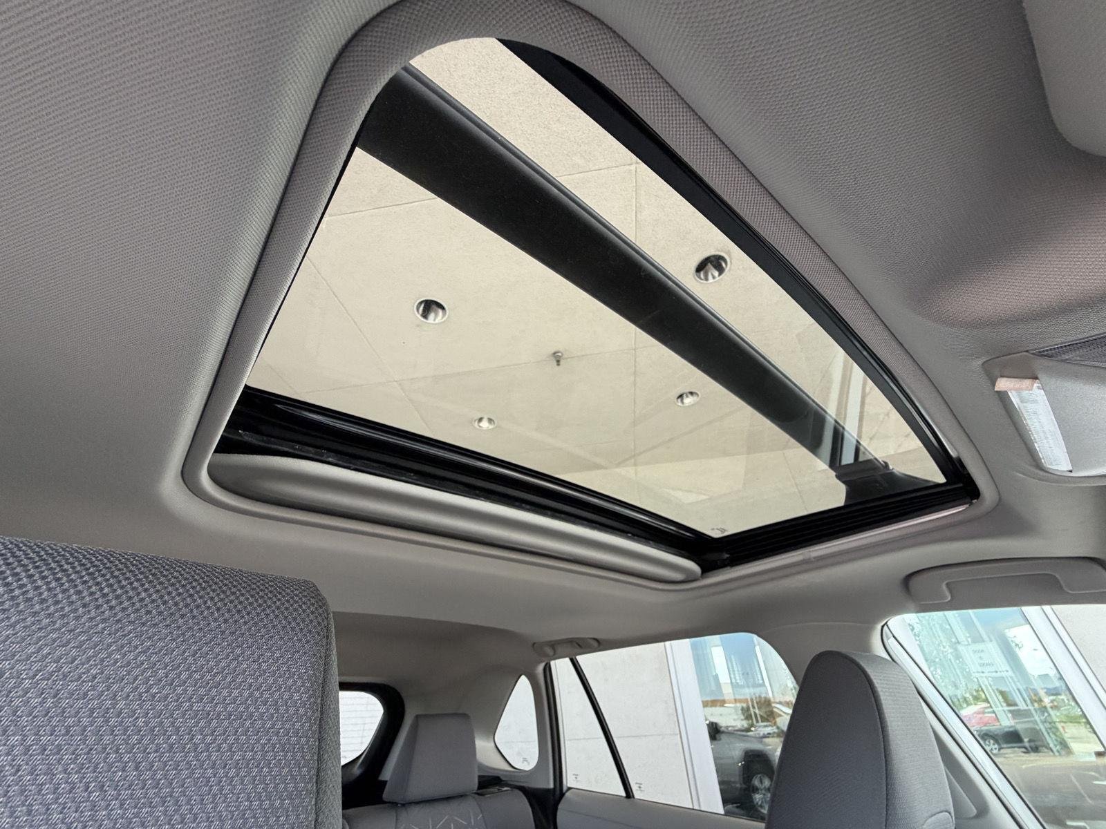 Used 2021 Silver Sky Metallic Toyota Hybrid XLE image 29