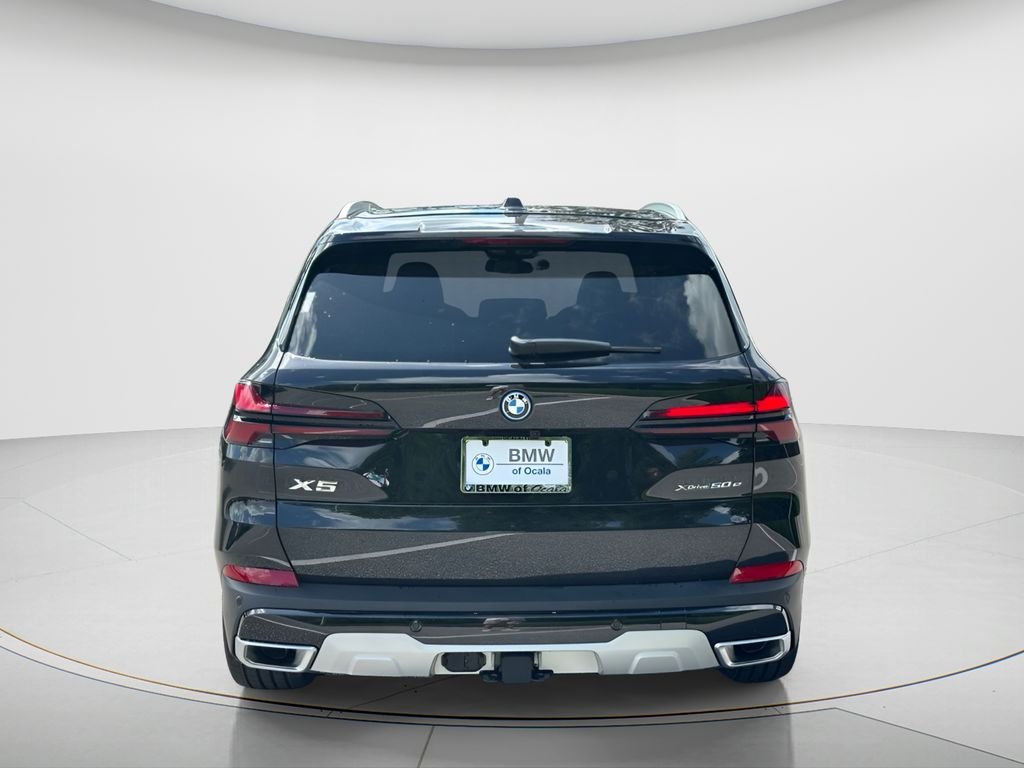 New 2026 Black Sapphire Metallic BMW xDrive50e image 6
