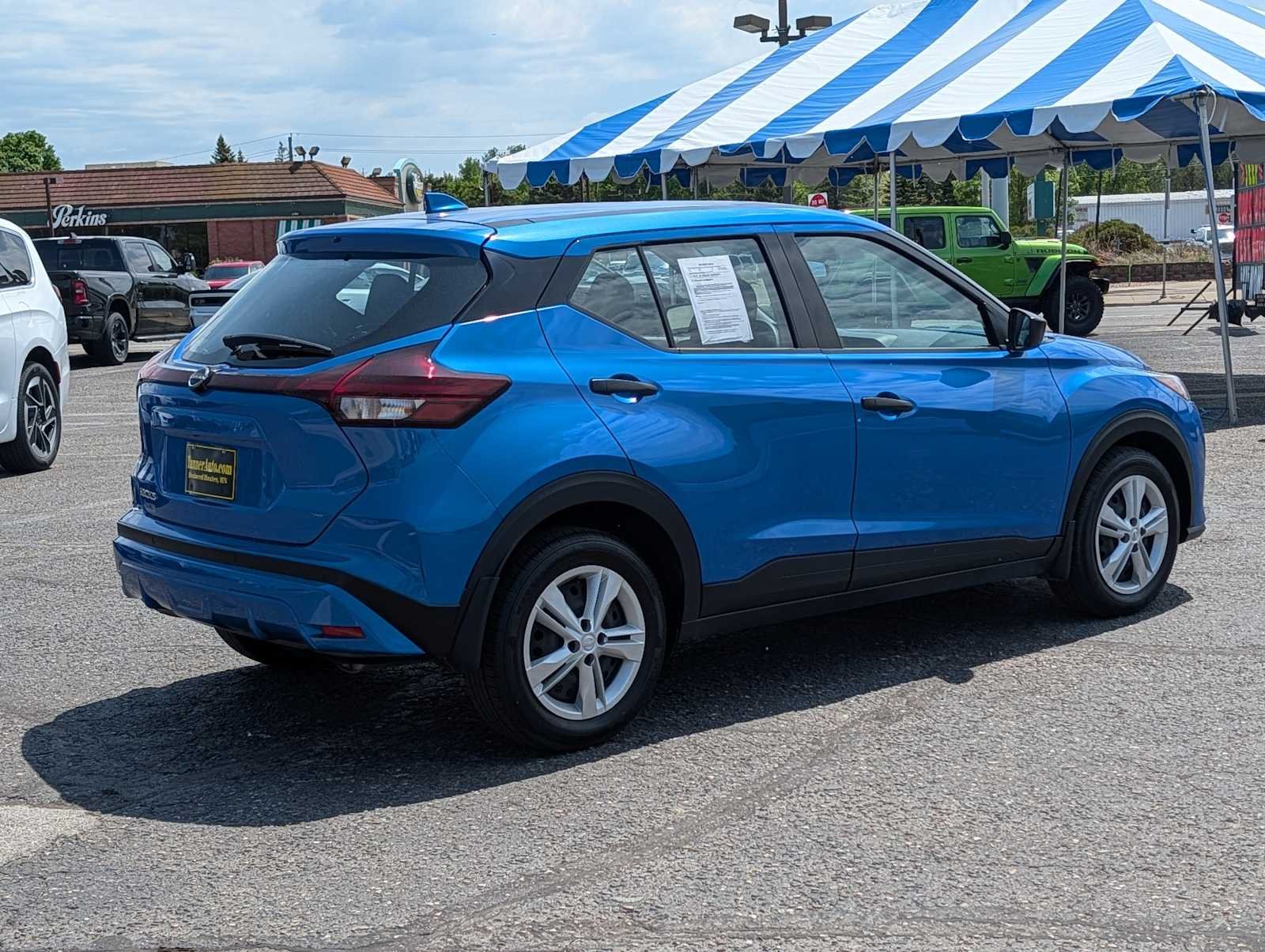 Used 2024 Electric Blue Metallic Nissan S image 7