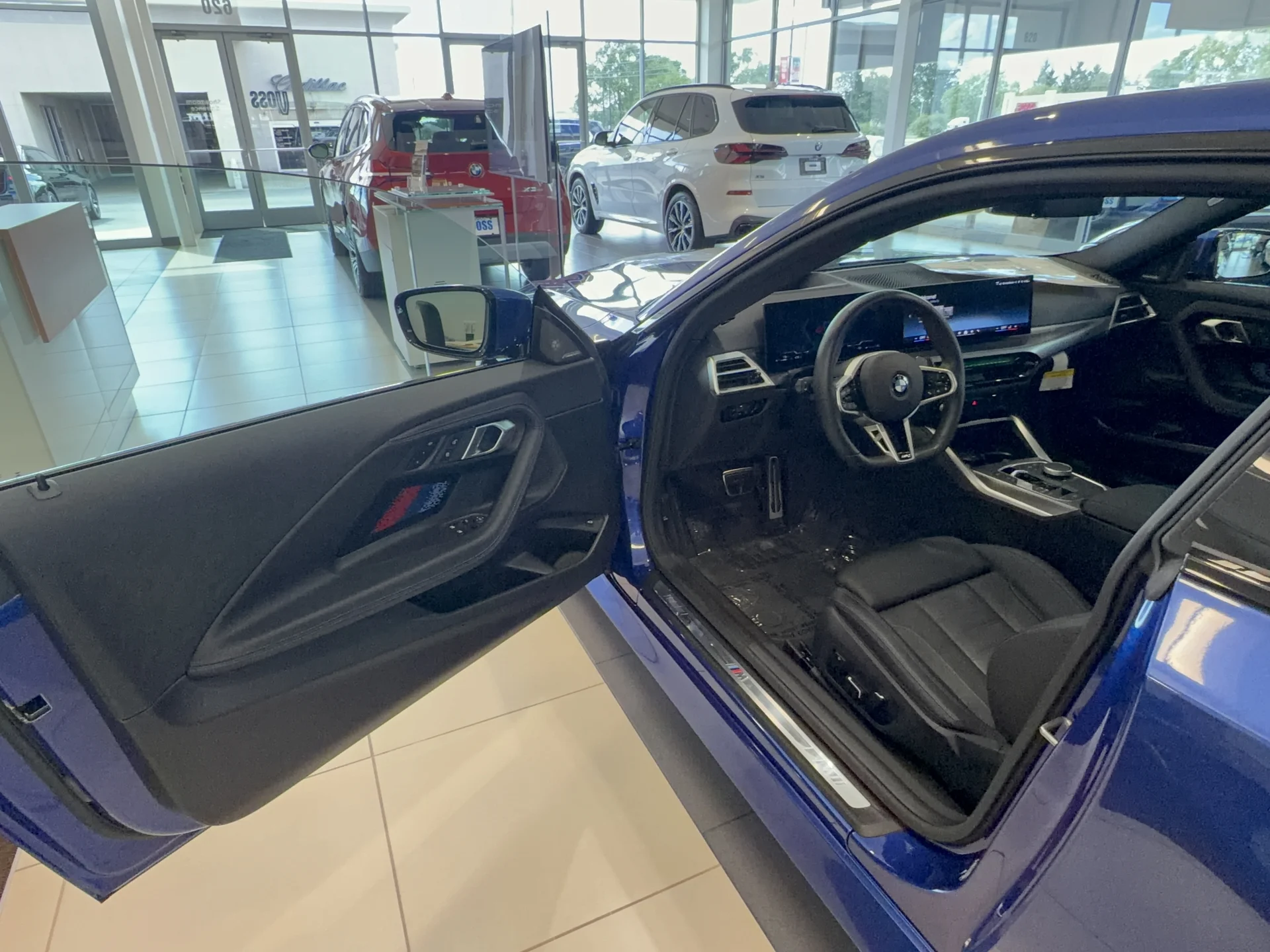 New 2025 Portimao Blue Metallic BMW i xDrive image 7