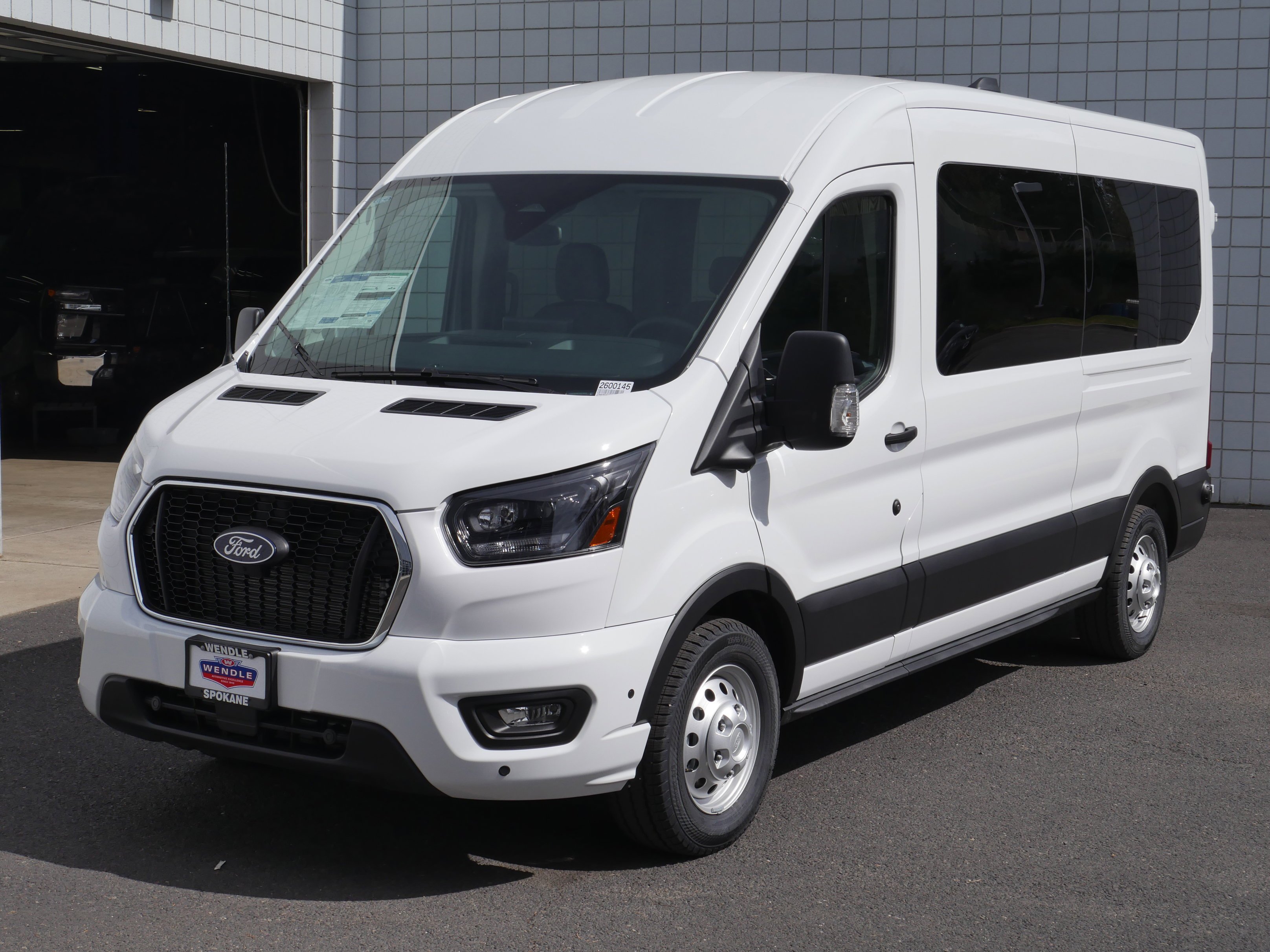 New 2026 Oxford White Ford Passenger Van XLT image 2