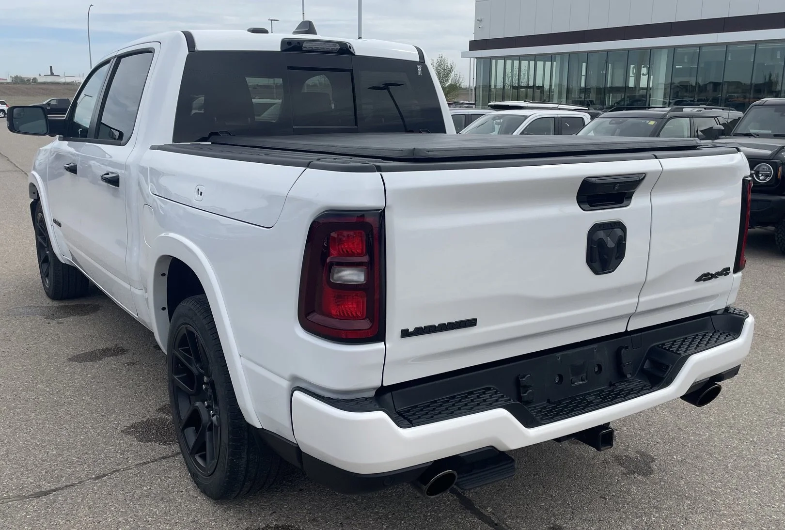 Used 2025 Ivory Tri-Coat Pearl Ram LARAMIE image 3