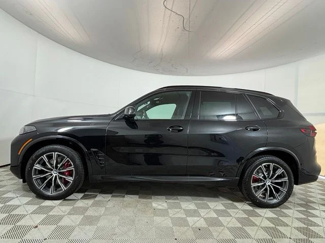 New 2026 Black Sapphire Metallic BMW xDrive40i image 4