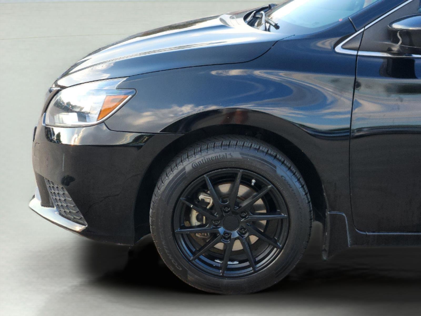 Used 2016 Super Black Nissan SV image 8