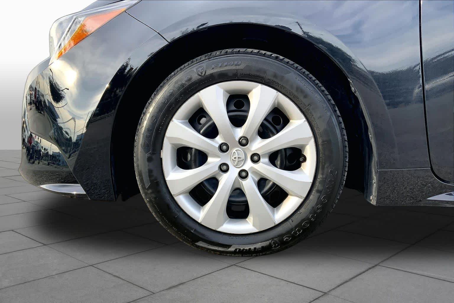 Used 2025 Midnight Black Metallic Toyota LE image 11