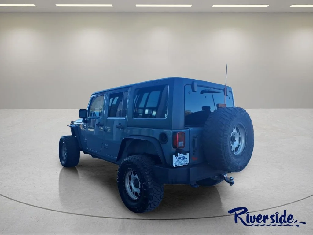 Used 2015 Gray Jeep Unlimited Sport image 4