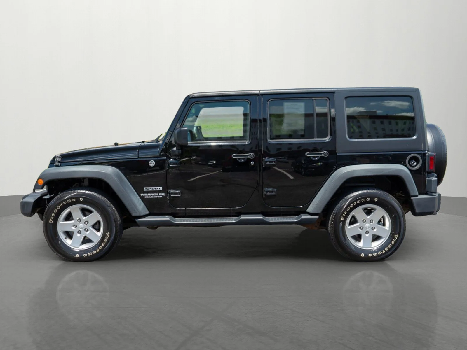 Used 2012 Black Clearcoat Jeep Unlimited Sport image 4