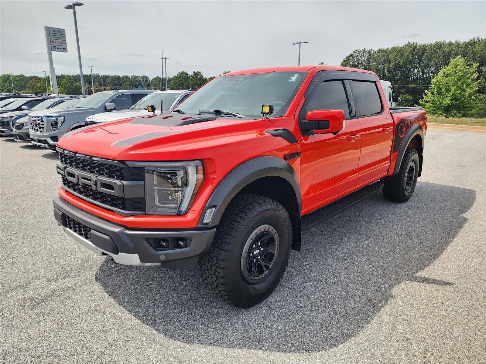 Used 2023 Code Orange Metallic Ford Raptor image 3