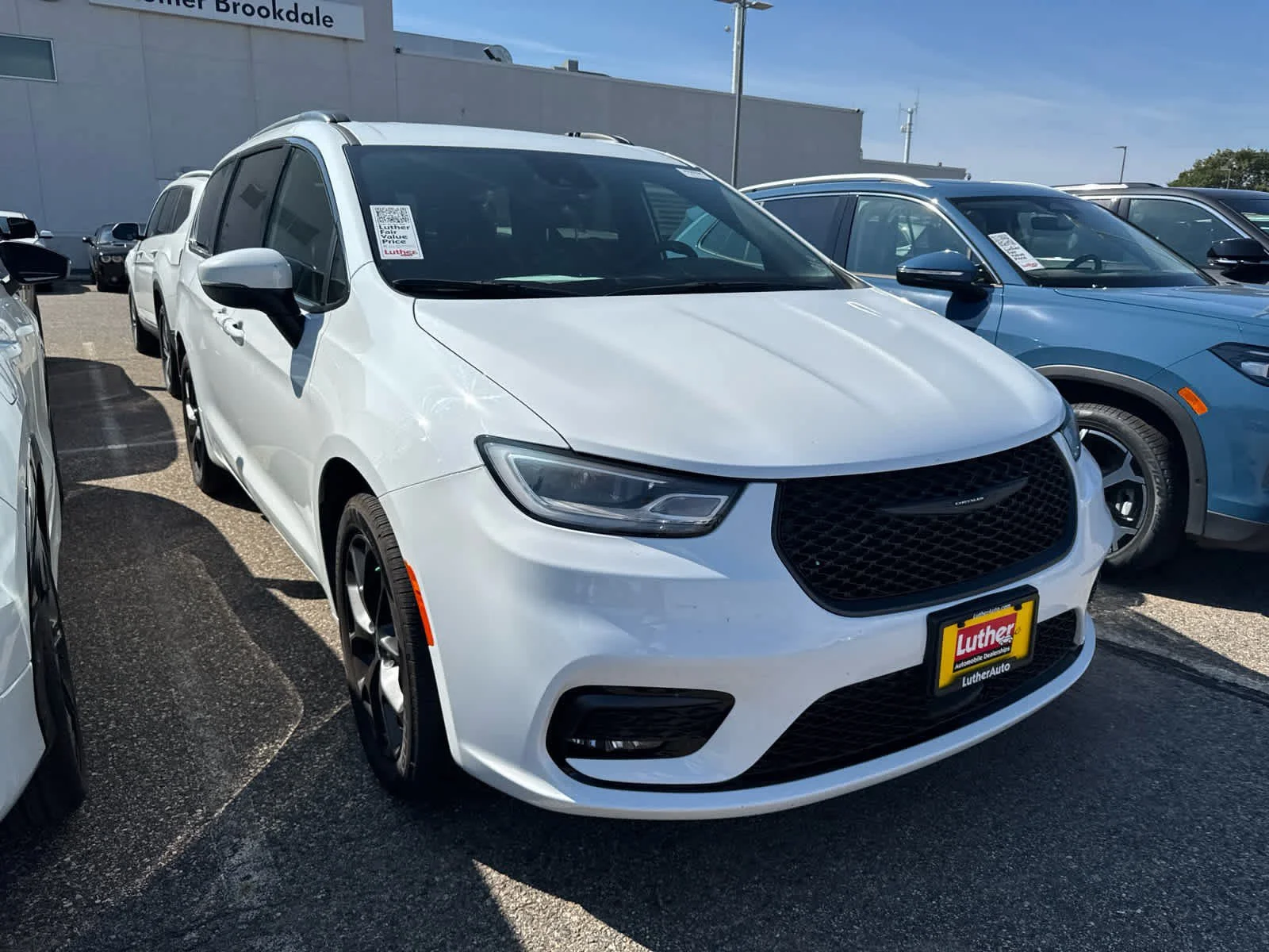 Used 2023 Chrysler Pacifica Touring L with VIN 2C4RC3BG0PR503621 for sale in Brooklyn Center, Minnesota