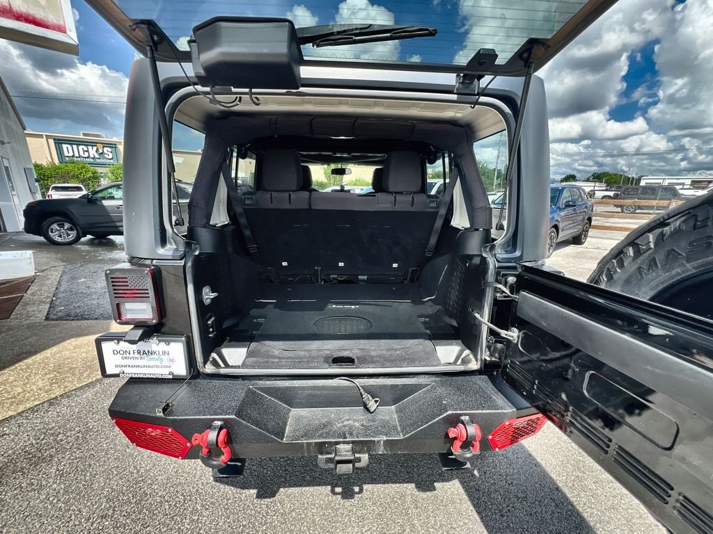 Used 2015 Black Jeep Unlimited Sport image 23