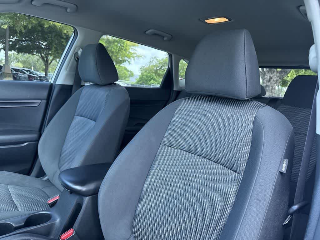 Used 2024 Snow White Pearl Kia LX image 14