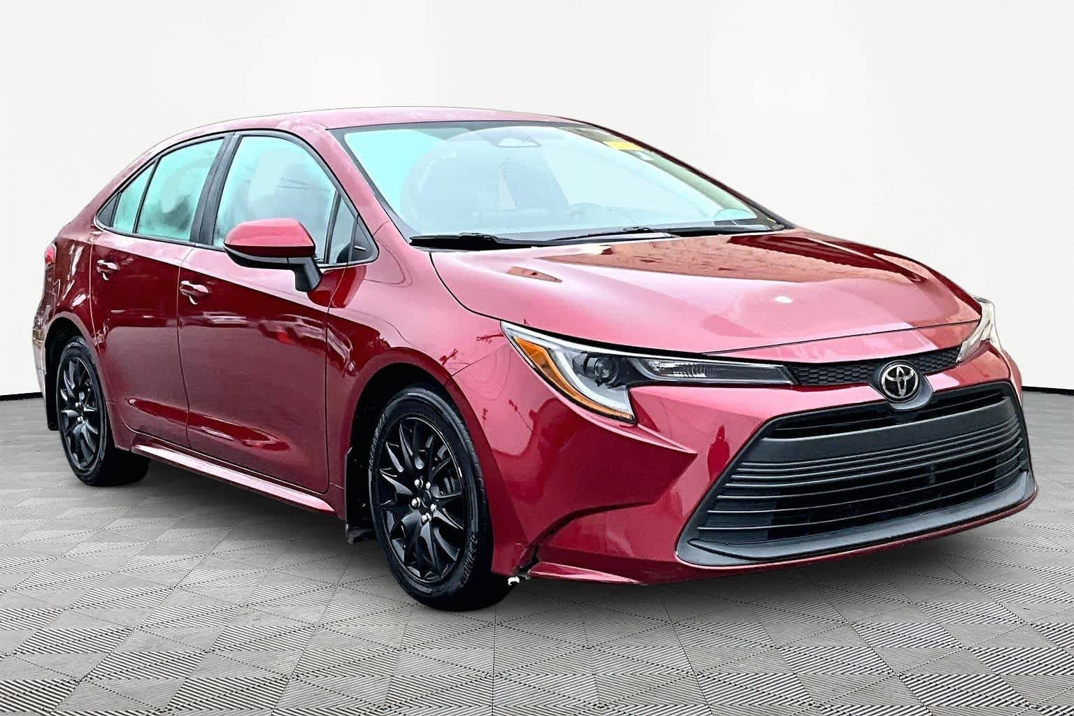 Used 2025 Ruby Flare Pearl Toyota LE image 3