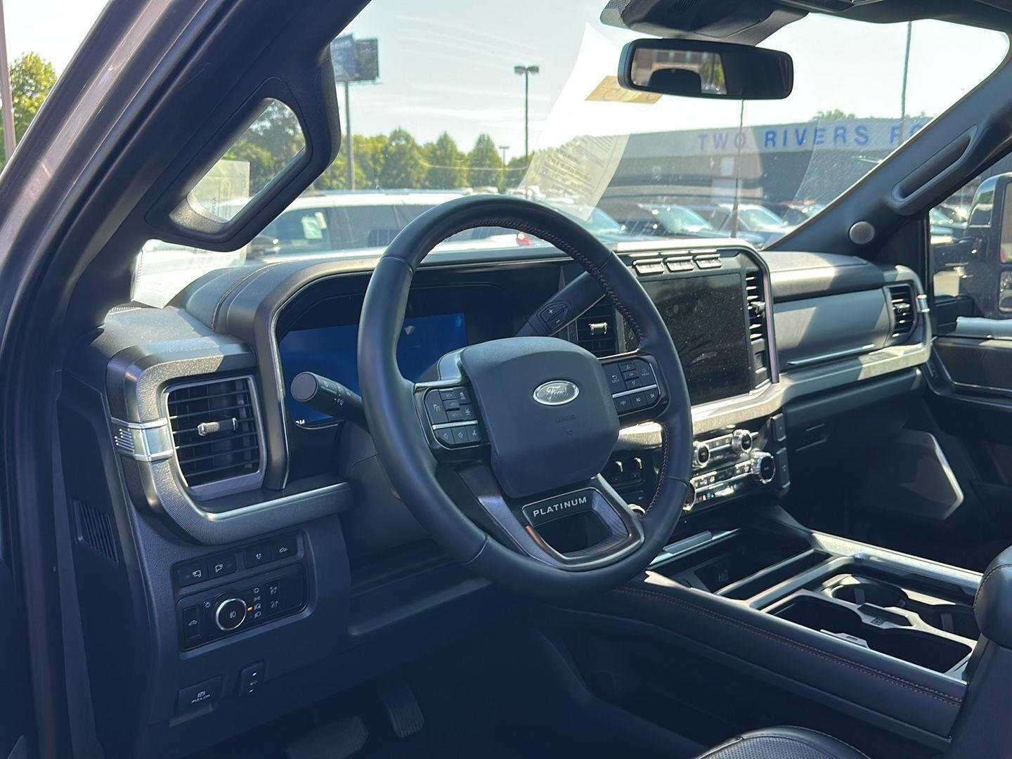 Used 2026 Carbonized Gray Metallic Ford LARIAT image 2