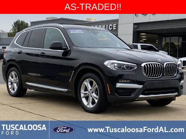 Used 2020 Black BMW sDrive30i image 1
