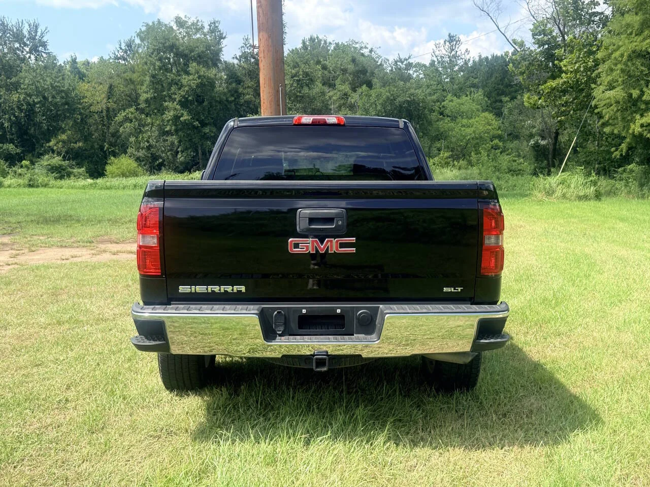 Used 2015 Black GMC SLT 4x2 4dr Crew Cab 5.8 ft. SB image 4